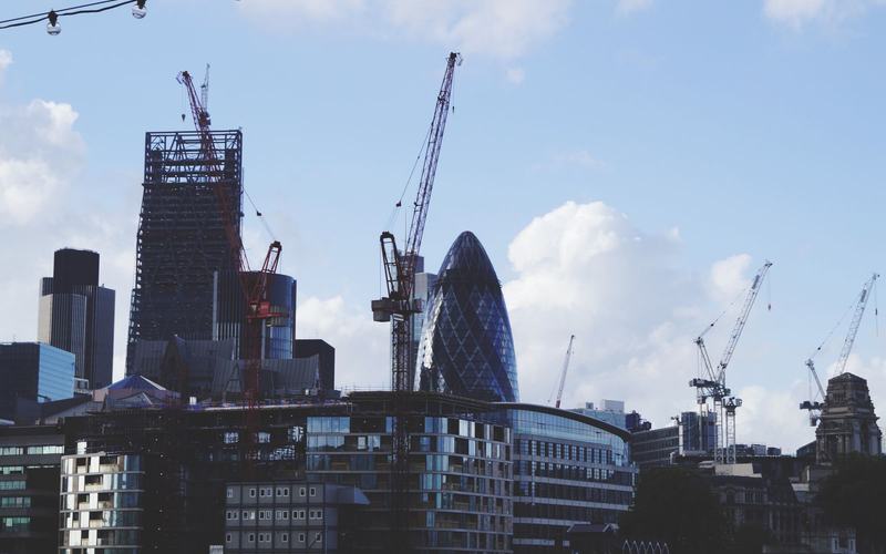 Tower cranes over a large city construction project